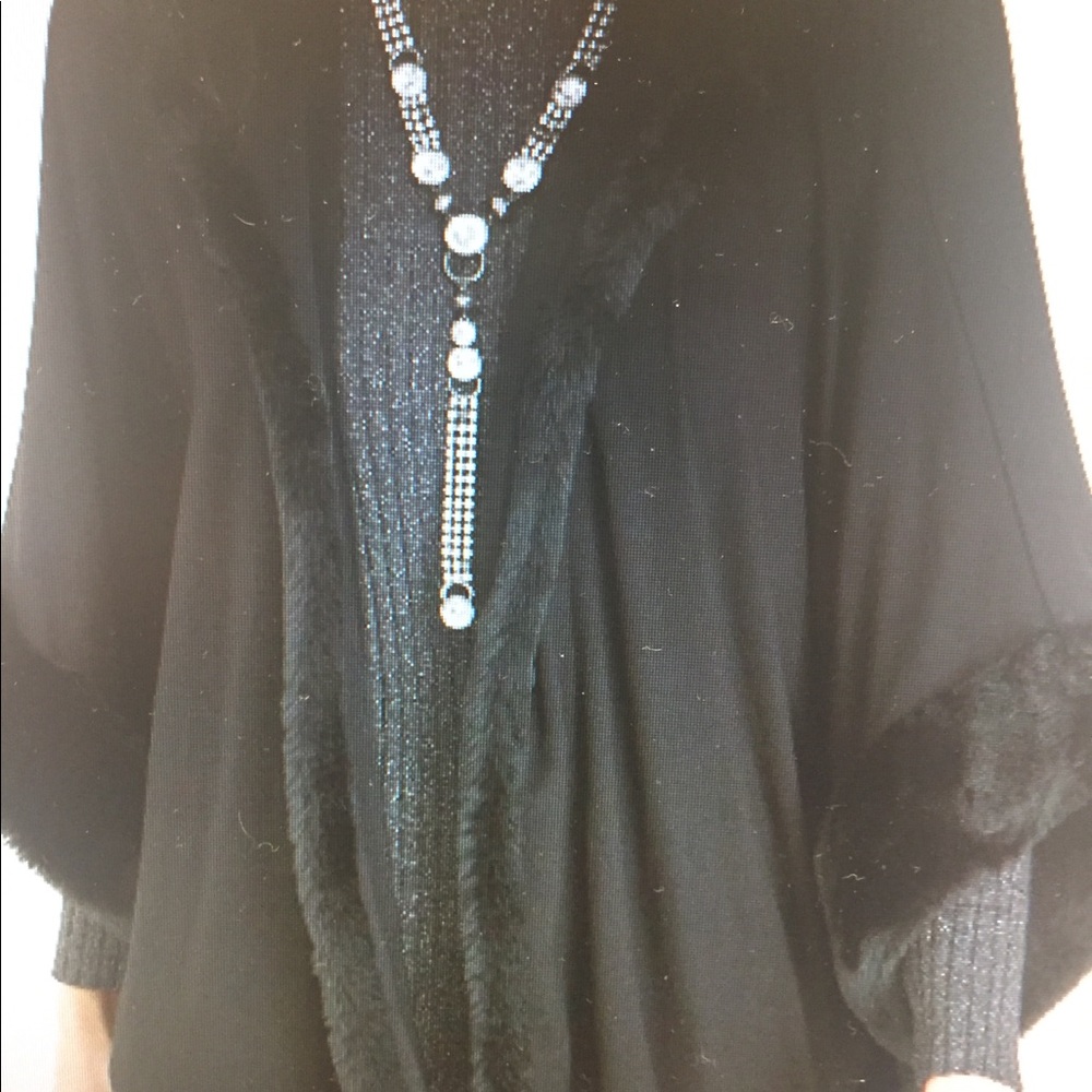 Beautiful poncho style with hood